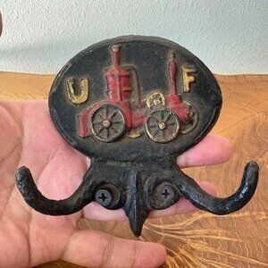 Vintage Cast Iron Union Firefighter Insurance Fire Mark Wall Hook Fire Engine